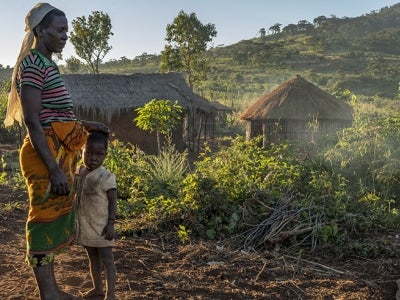 The people living on the mountain are the poorest of the poor and the unluckiest of the unlucky - losing children, homes and crops to the conflict and lacking schools and medical clinics. These women, having seen years of fighting, were not willing to give up. Photo: <a href=__jen.html Guyton</a>.
