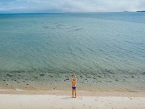 Lewis Pugh standing on the shore in Martha's Vineyard preparing to start his 2025 Shark Swim